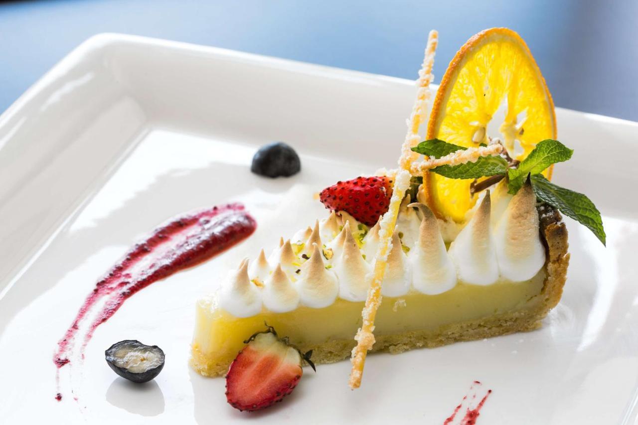 Radisson Blu Hotel & Convention Centre Kigali Zewnętrze zdjęcie A lemon meringue tart